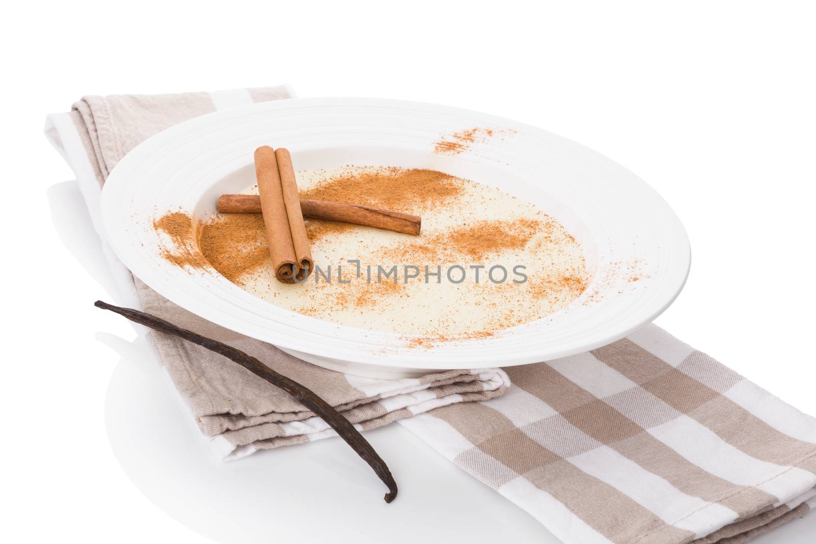 Delicious porridge breakfast with cinnamon and cocoa powder. Traditional breakfast eating. 