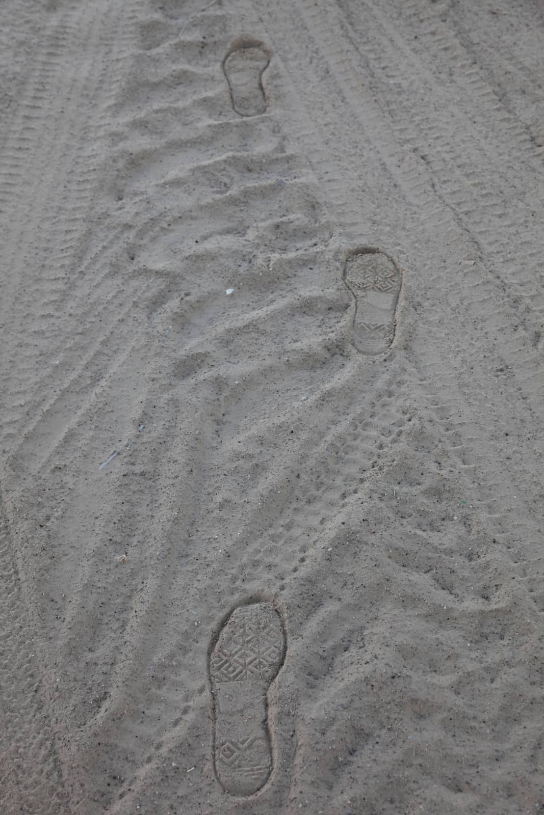Human trace of a foot on sand