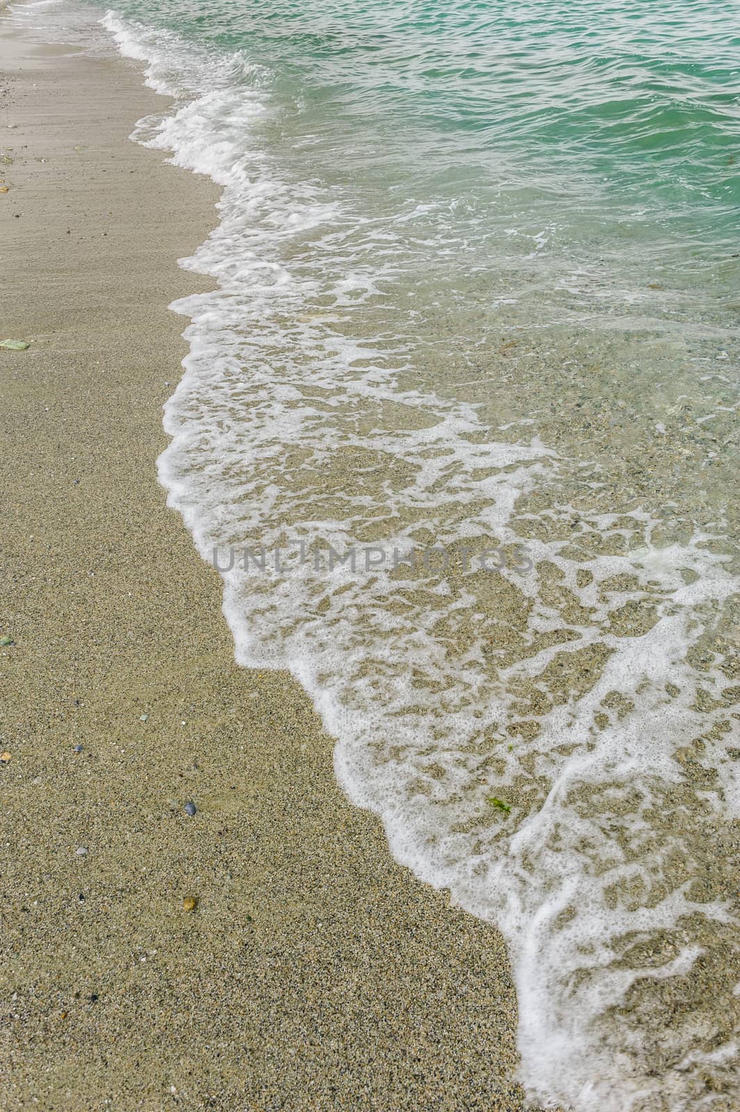 sand and wave at the beach background