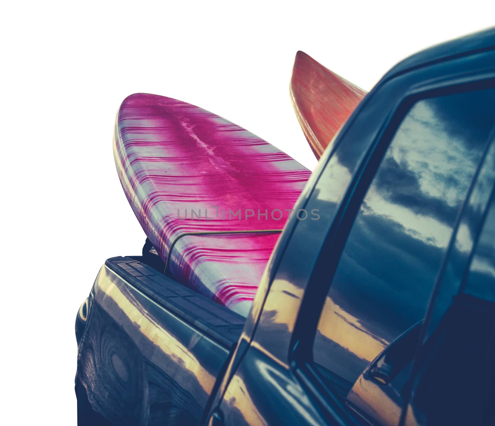 Retro Filtered Isolated Surfboards In A Truck At Sunset In Hawaii