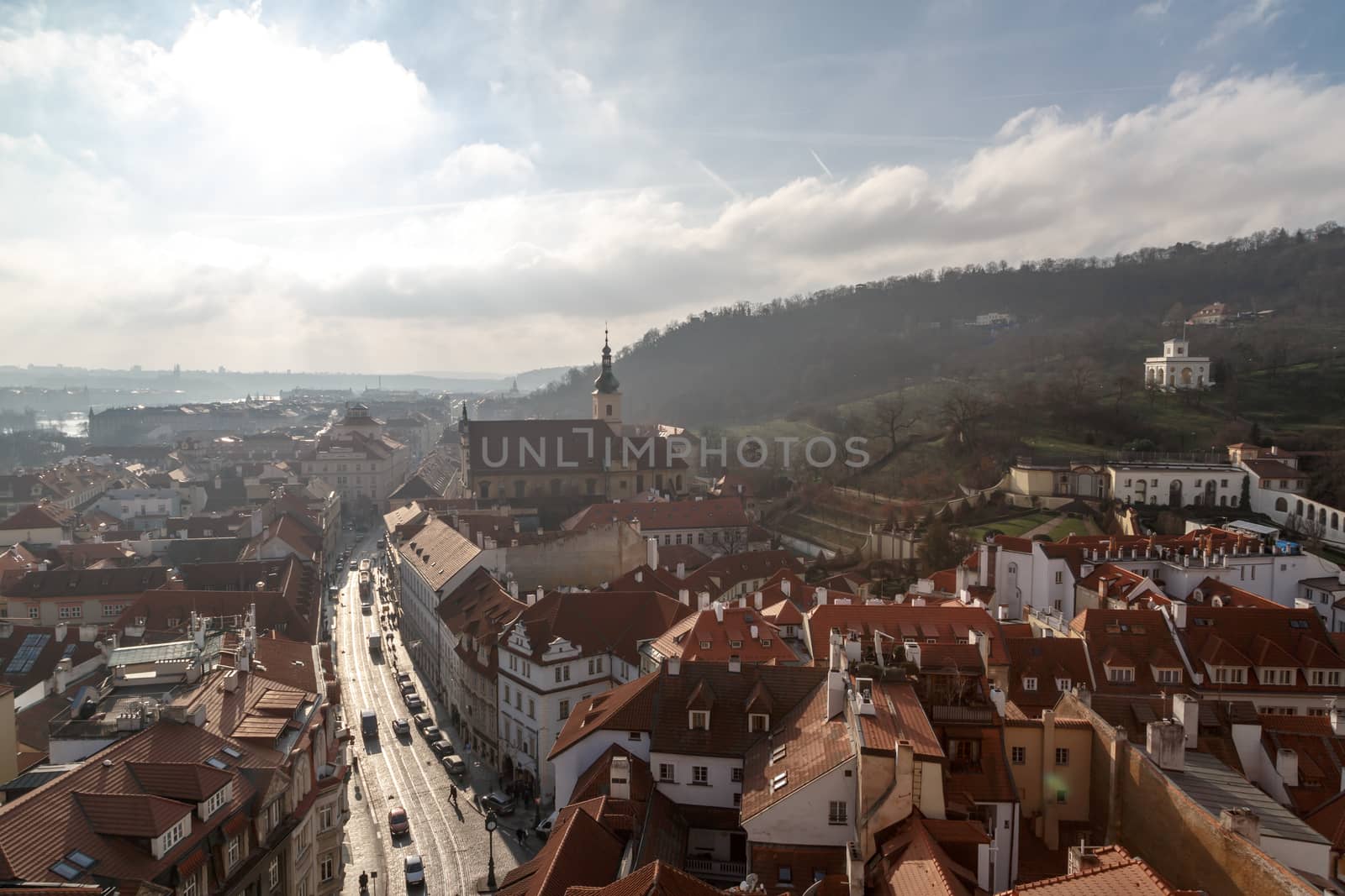 PRAGUE, CZECH REPUBLIC - DECEMBER 31, 2015 : General top view of Prague cityscape view with historical gothic buildings around, on cloudy sky background.