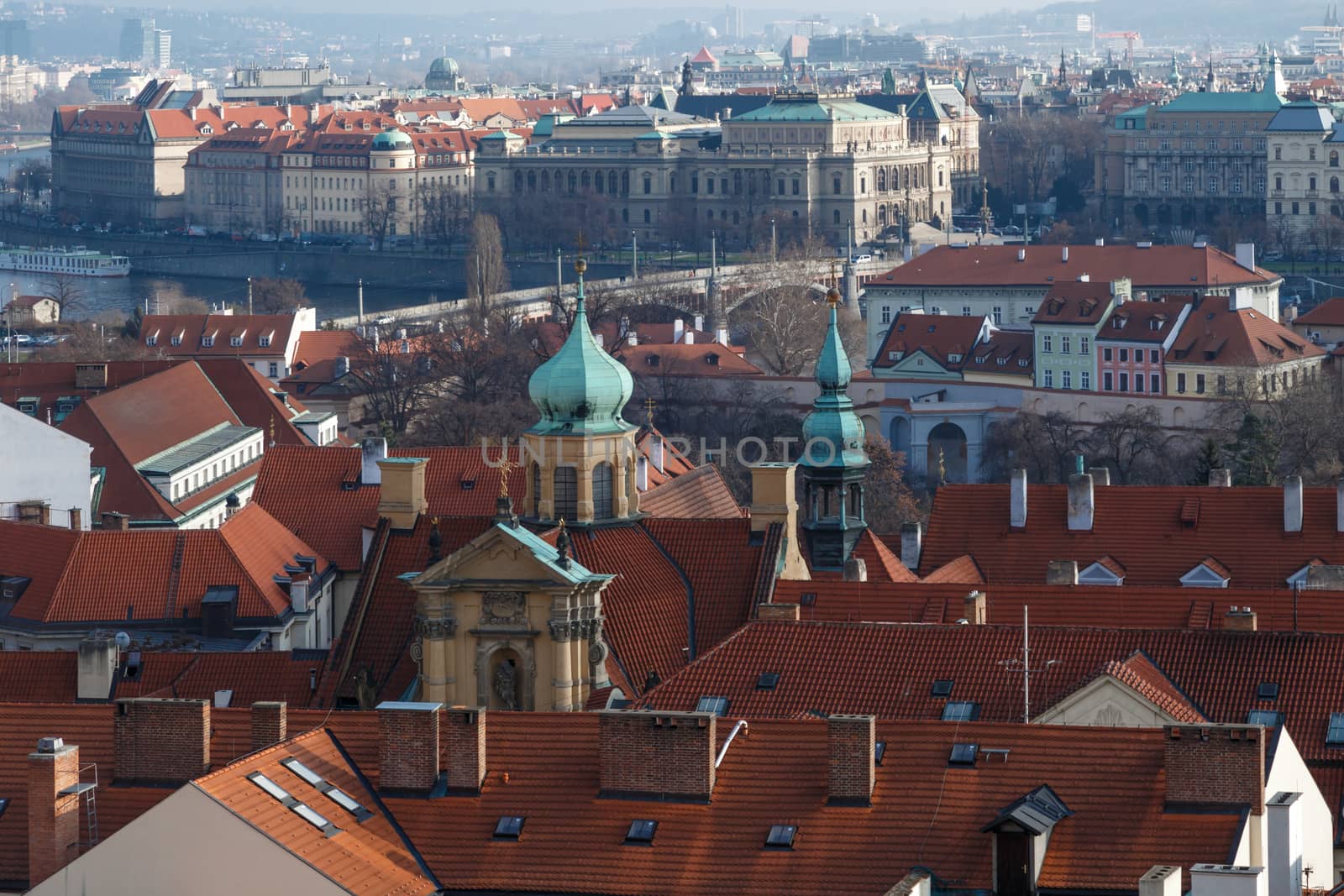 General top view of Prague cityscape view with historical gothic buildings around.