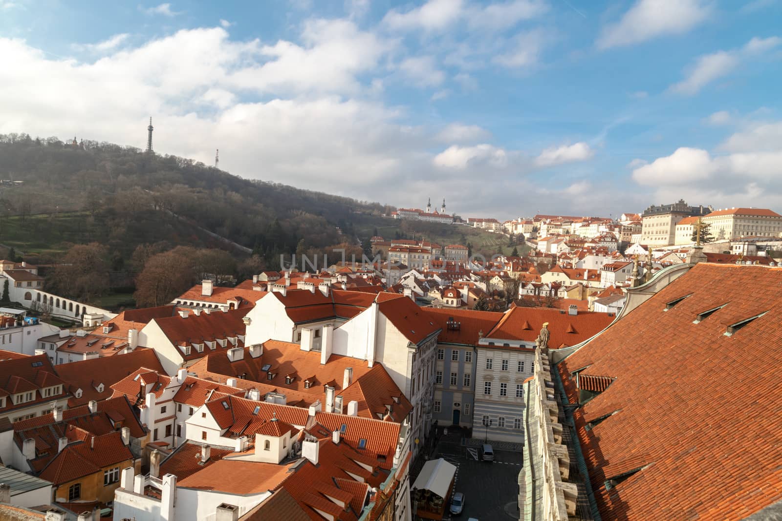 PRAGUE, CZECH REPUBLIC - DECEMBER 31, 2015 : General top view of Prague cityscape view with historical gothic buildings around, on cloudy sky background.