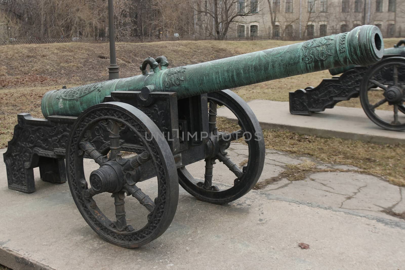 old medieval bronze cannon on the gun carriage 