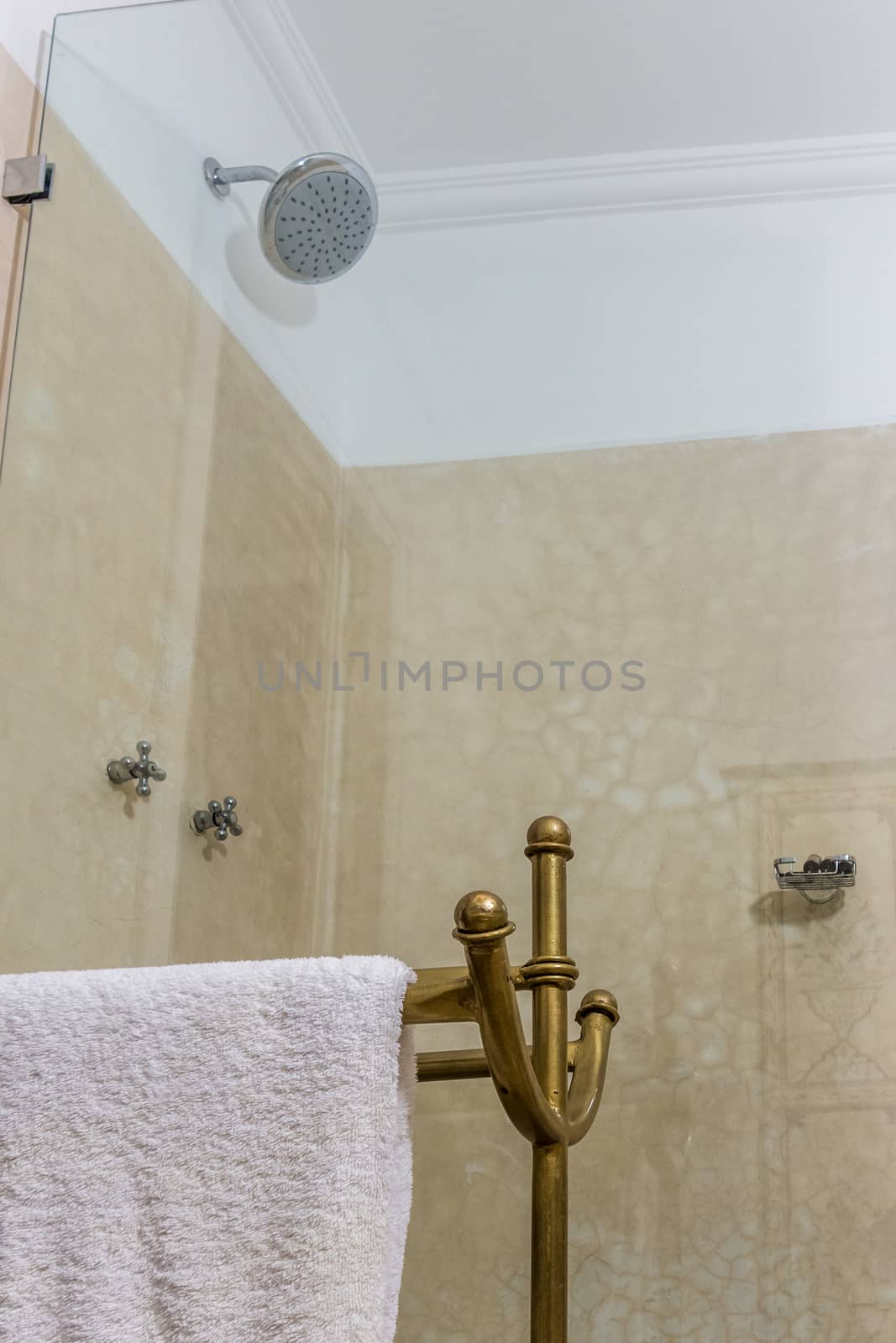 Glazed shower with towel holder