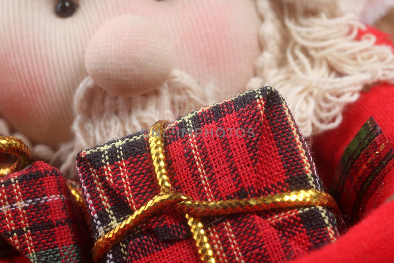 Red gift with gold bow