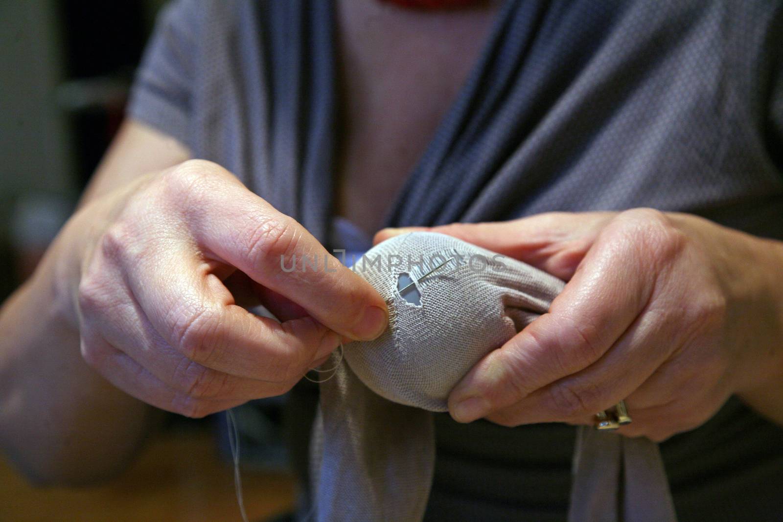 Crisis, mending socks