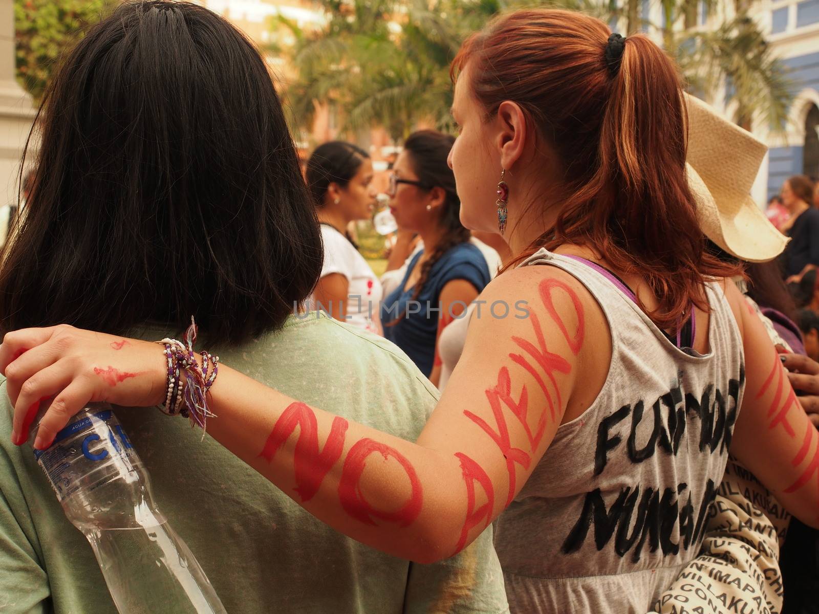 PERU, Lima: A protester has paint on her arms reading 'No Keiko' as dozens of thousands of people took to the streets on April 5, 2016 in Lima against his daughter Keiko Fujimori who has a strong led in the polls, just five days before the presidential election in Peru. The right-wing candidate is currently in first place, with roughly 40 percent support ahead of the vote on April 10. But if she does not win at least 50 percent there will be a run-off in June.Protesters denouced the Fujimoru dictatorship.