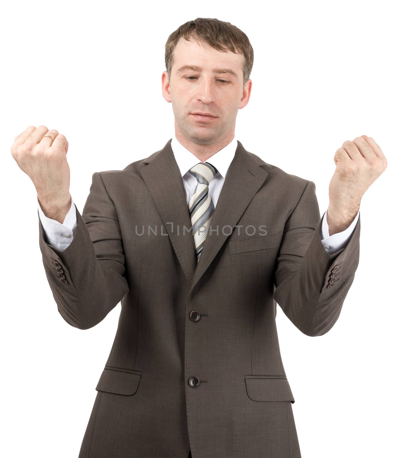 Businessman raised his hands up in front of him. Isolated on white background