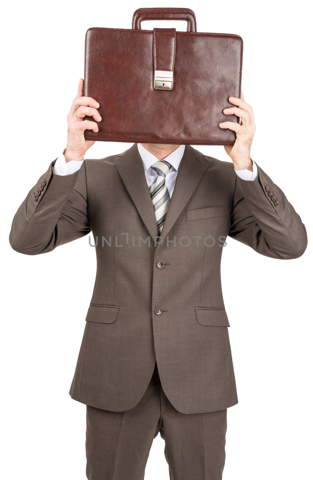Businessman in suit covered her head with leather briefcase. Isolated on white background