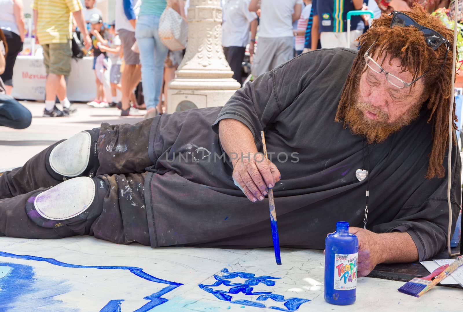 PASADENA, CA/USA - JUNE 21, 2015: Unidentified artist participating in the 2015 Pasadena Chalk Festival at Paseo Colorado.