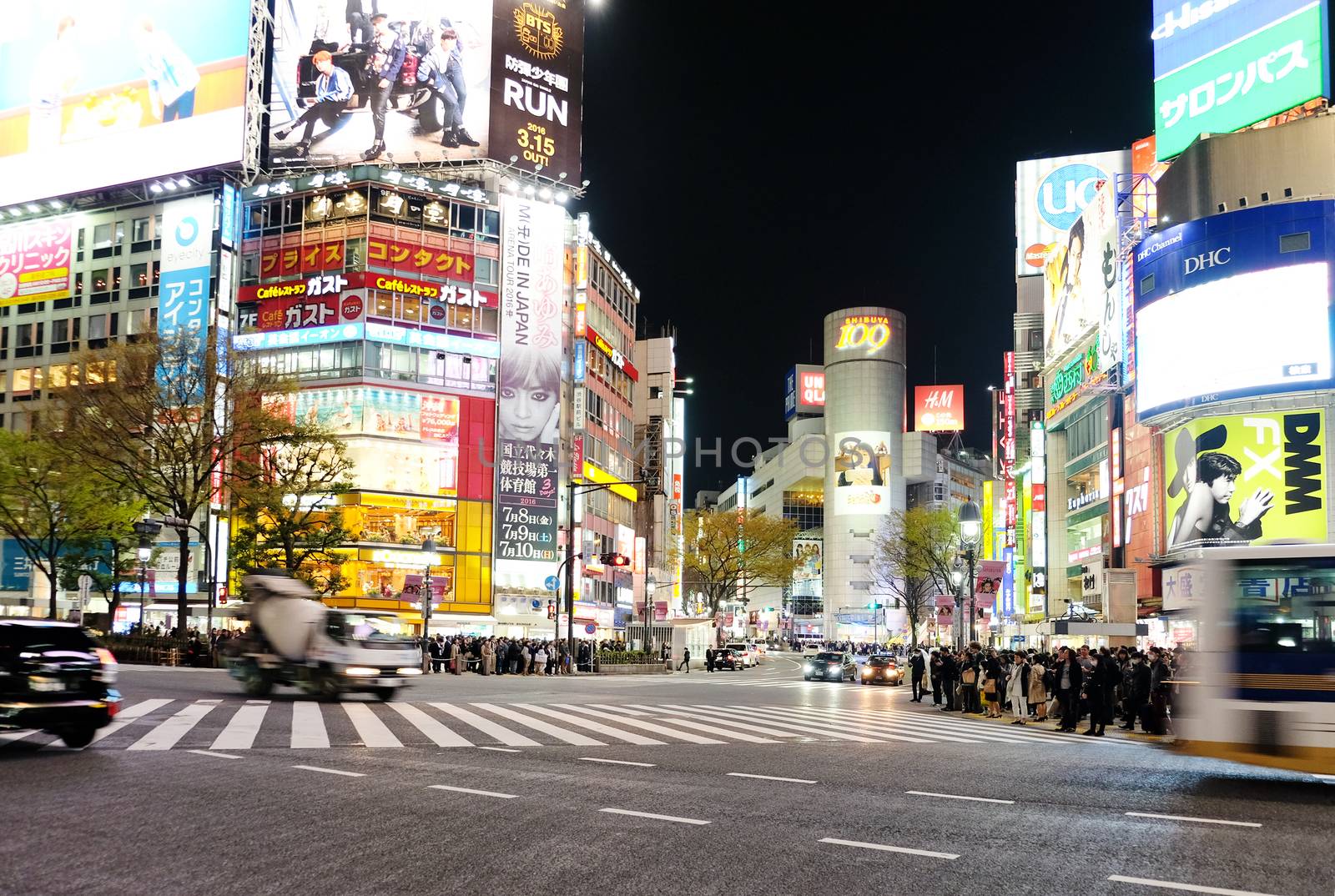Tokyo, Japan - March 29, 2016: Shibuya Crossing at Night, Crowds of people at Shibuya Crossing on 29 March 2016 in Tokyo, Japan. Shibuya Crossing is one of the busiest crosswalks in the world.