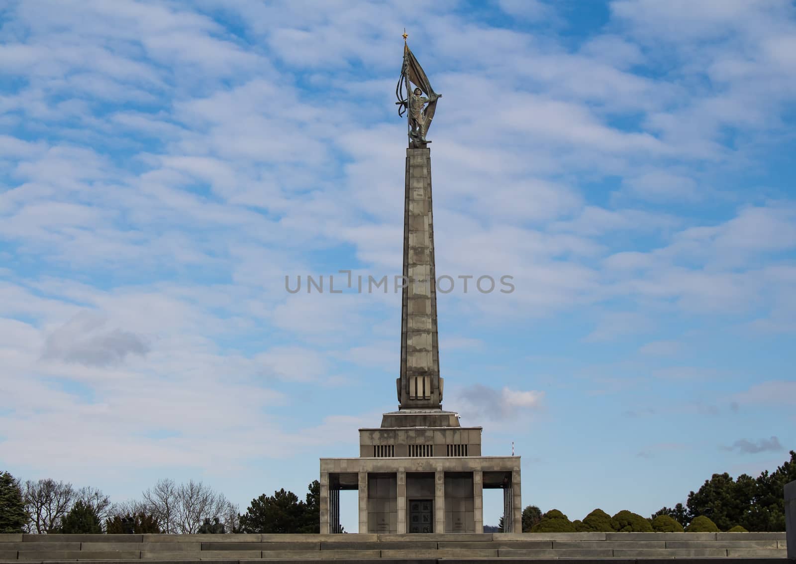 Memorial for the World War II. and graveyard of the soldiers, who perished while liberating the slovak capital Bratislava. Blue sky with many white clouds.