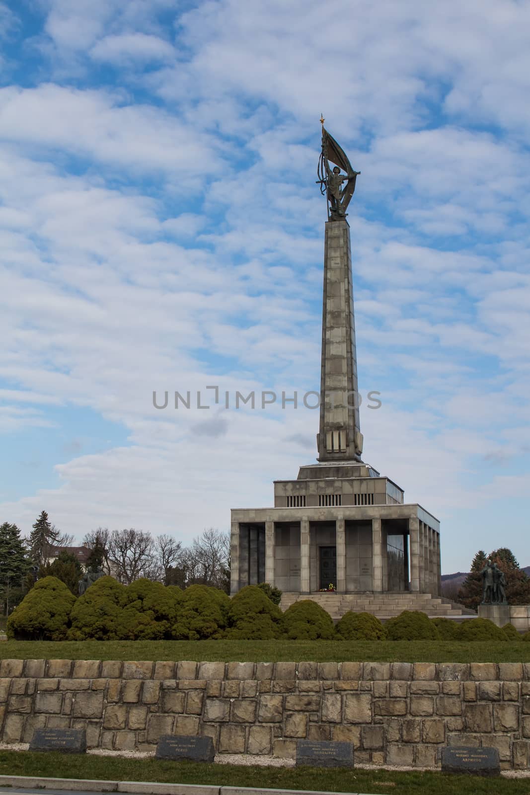 Memorial for the World War II. and graveyard of the soldiers, who perished while liberating the slovak capital Bratislava. Blue sky with many white clouds.