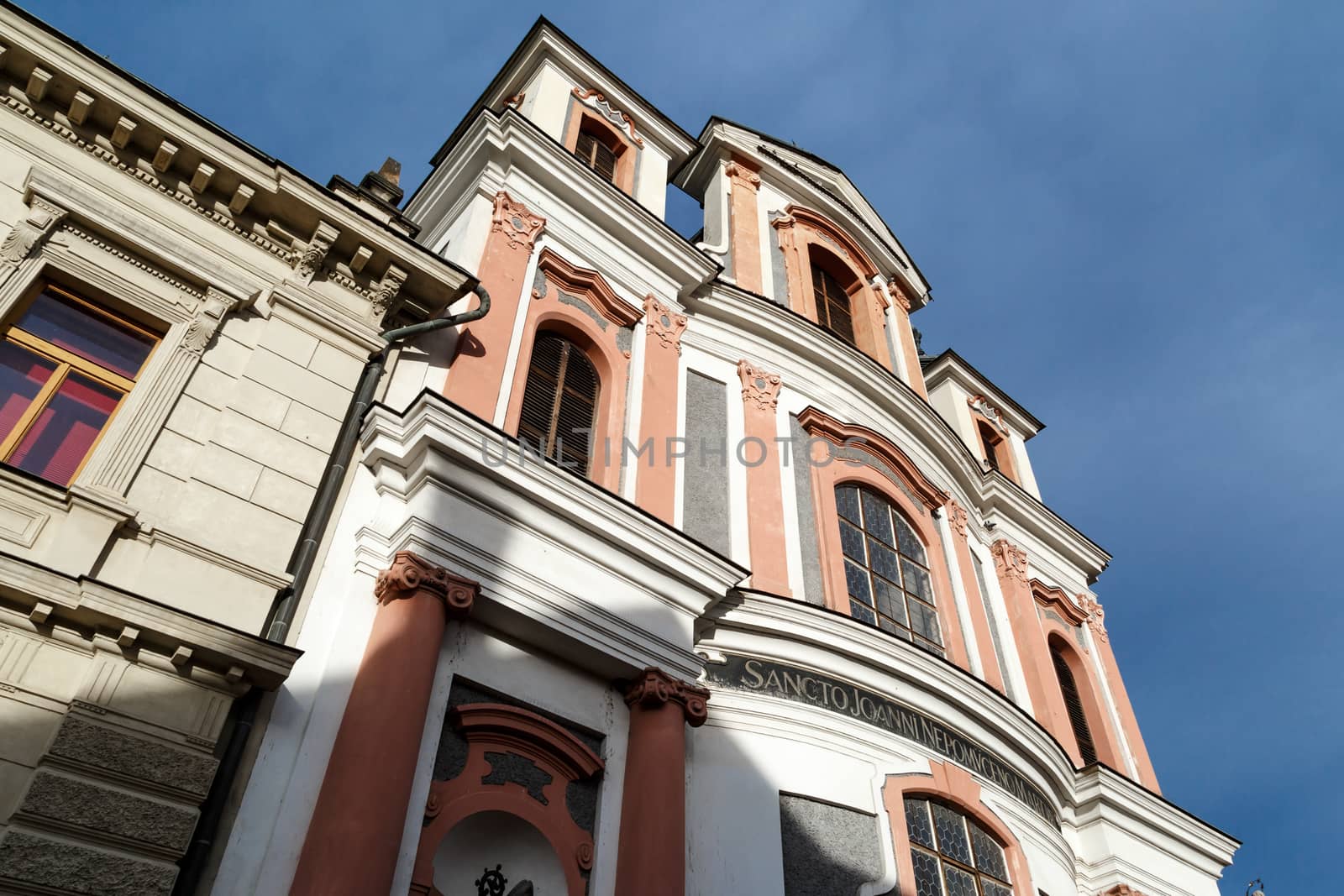 KUTNA HORA, CZECH REPUBLIC - DECEMBER 28, 2015 : Close up view of historical baroque building in Kutna Hora, on cloudy blue sky backgorund.