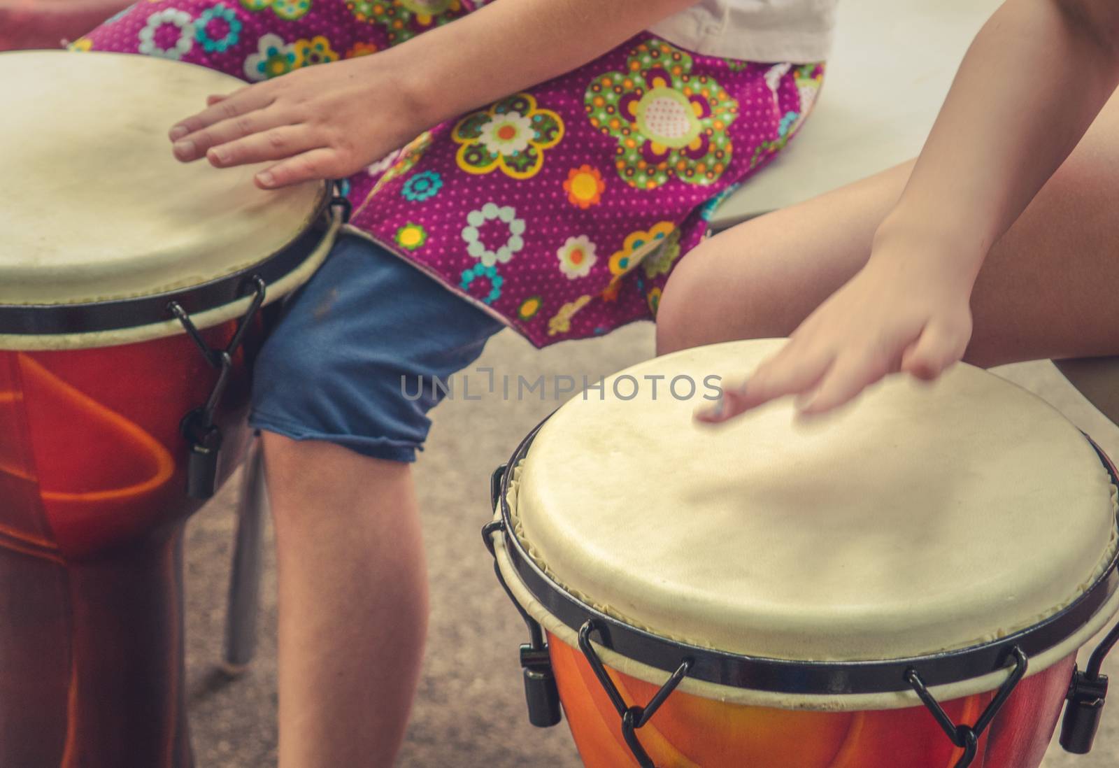 An Action Music Shot Of Children Drumming