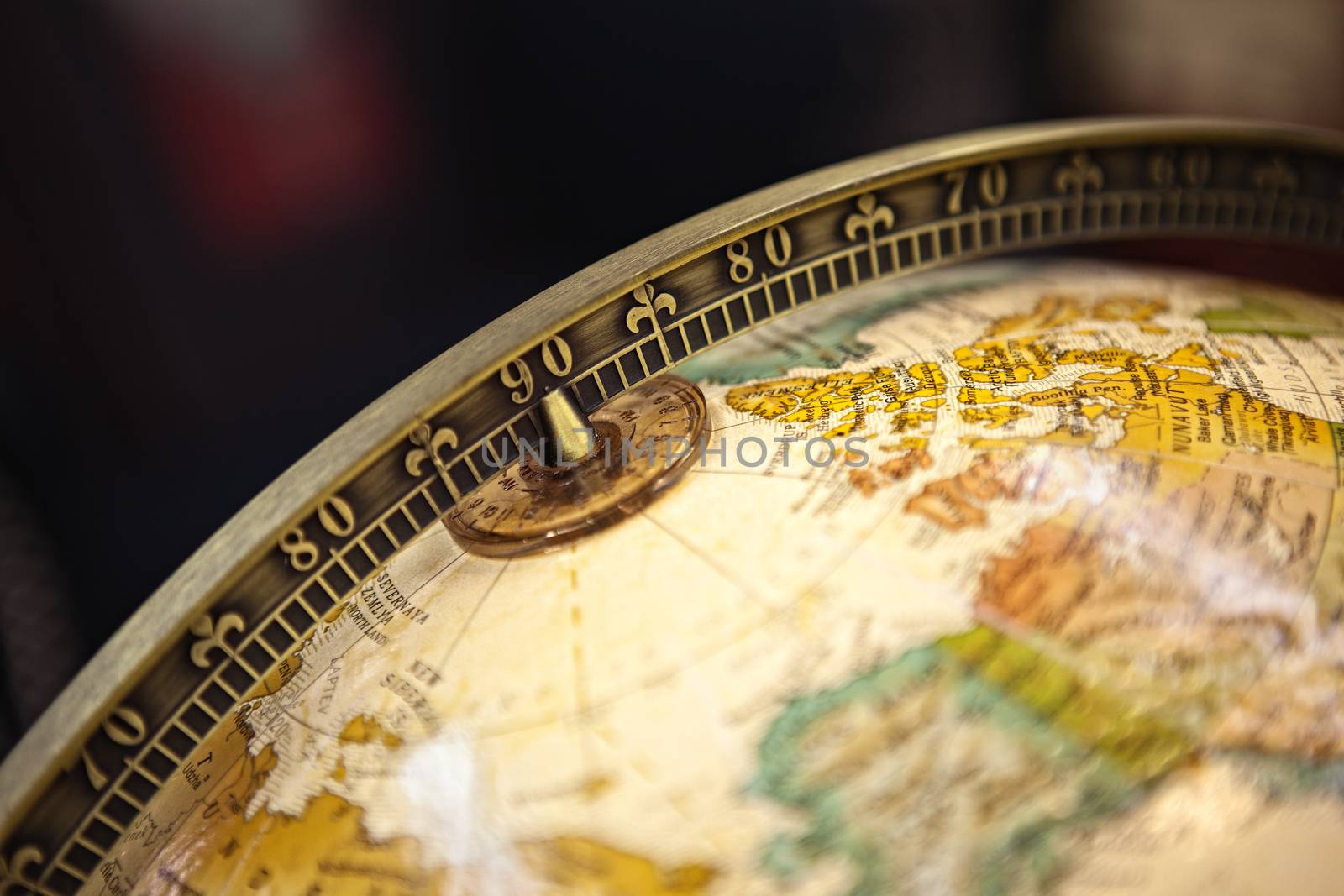 Close-up of a vintage globe. dark background