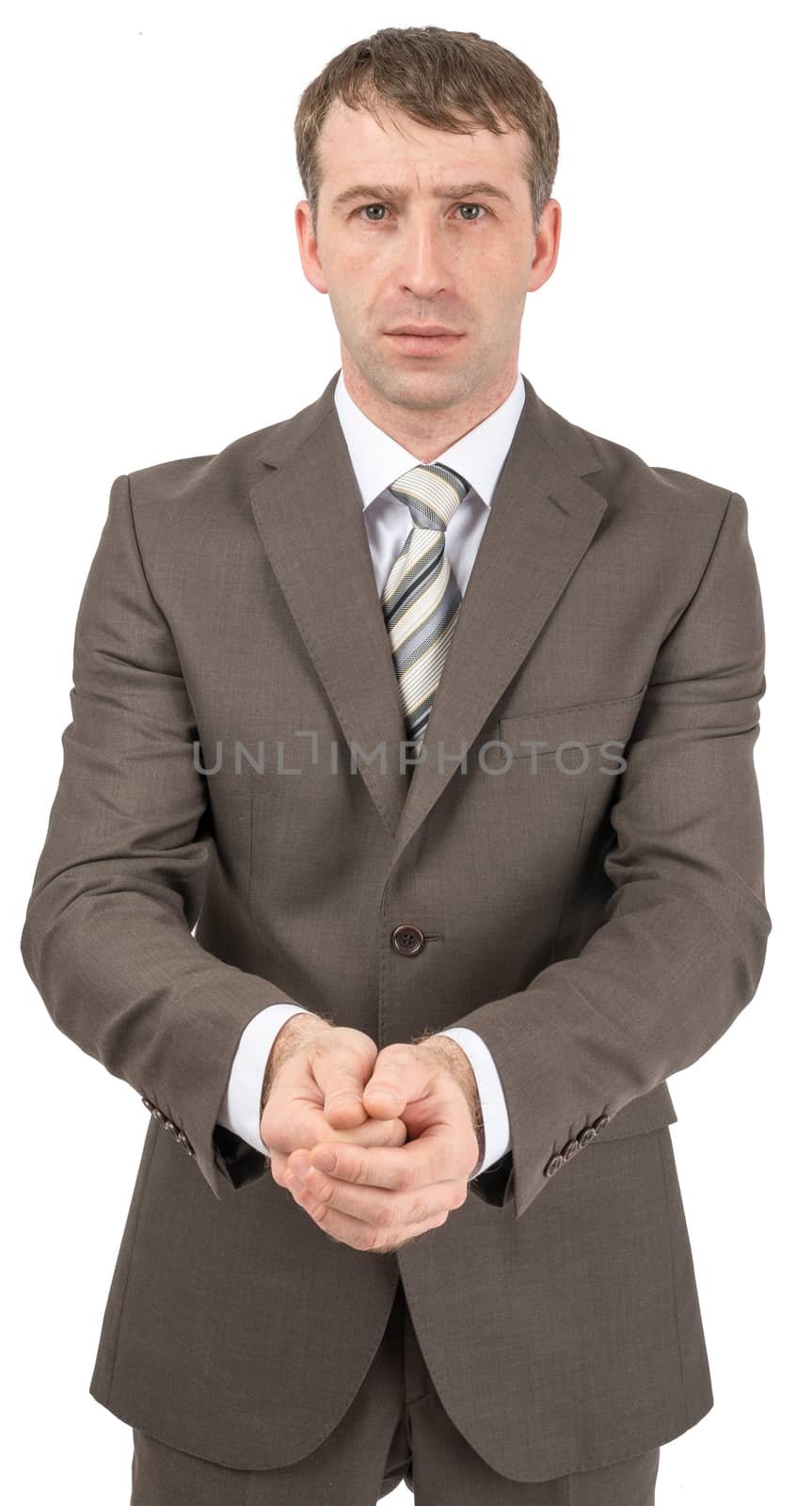 Unhappy businessman holding hands in front of him by cherezoff