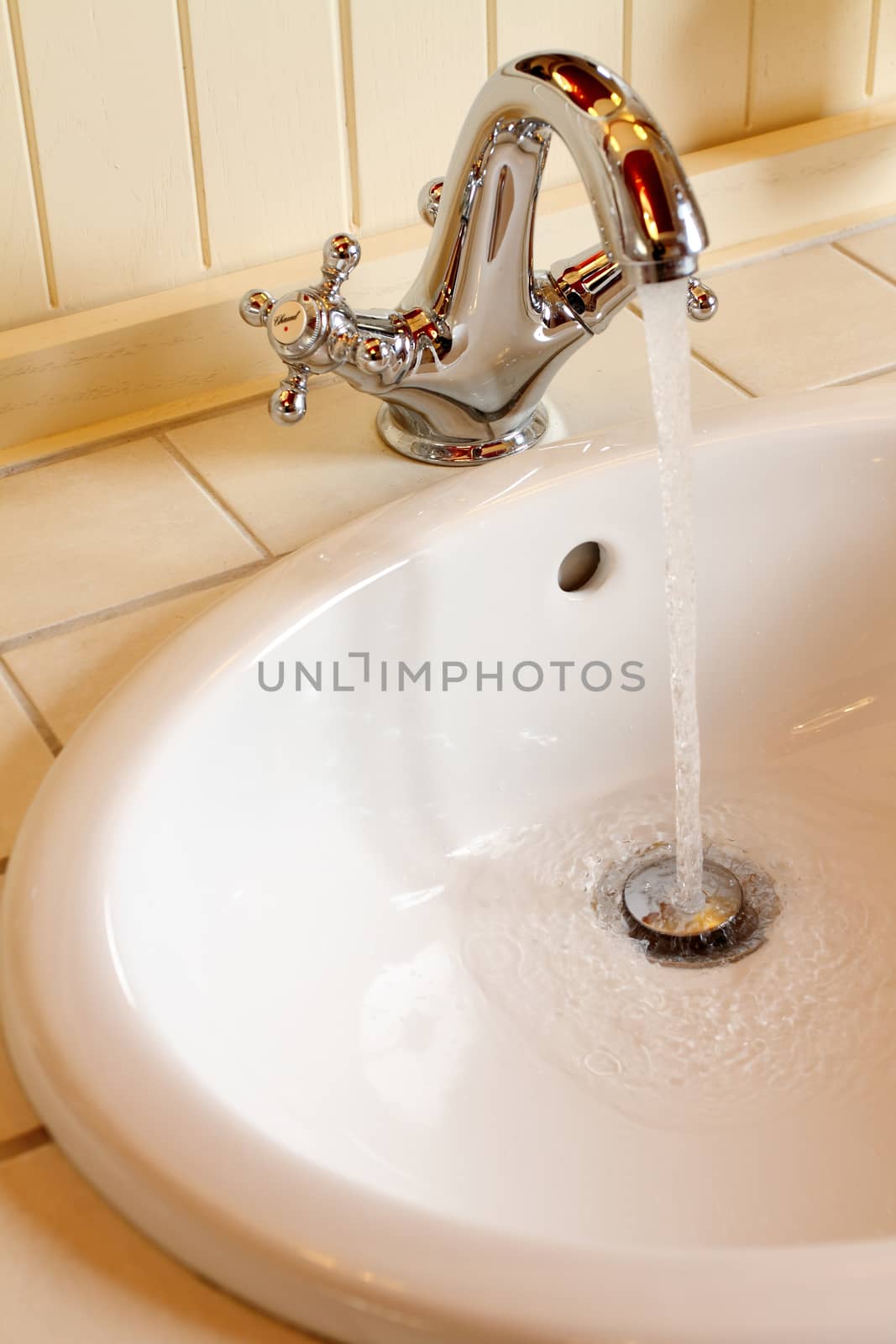 the current water from the mixer in a sink