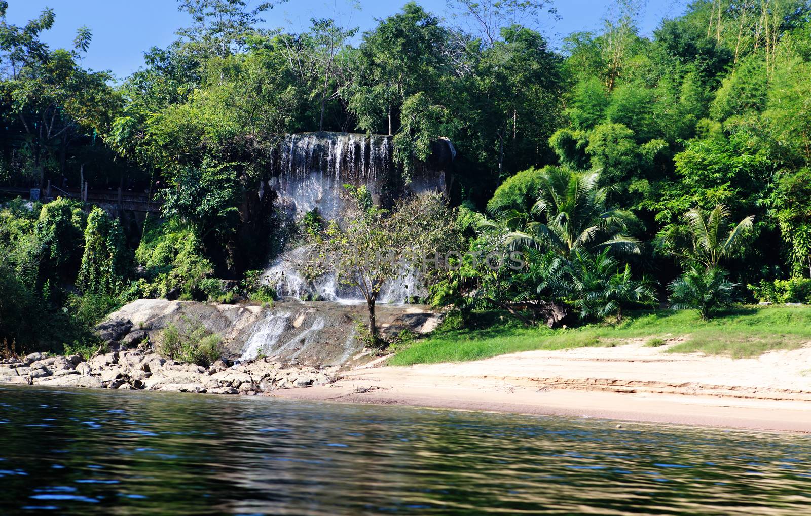 Kwai river and waterfall by ssuaphoto