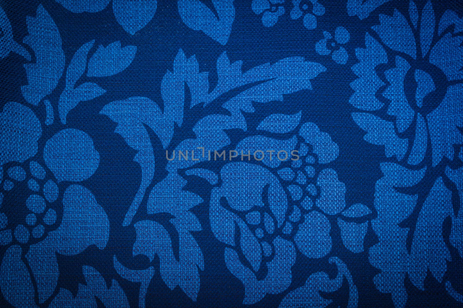 Rustic canvas fabric texture in blue color.