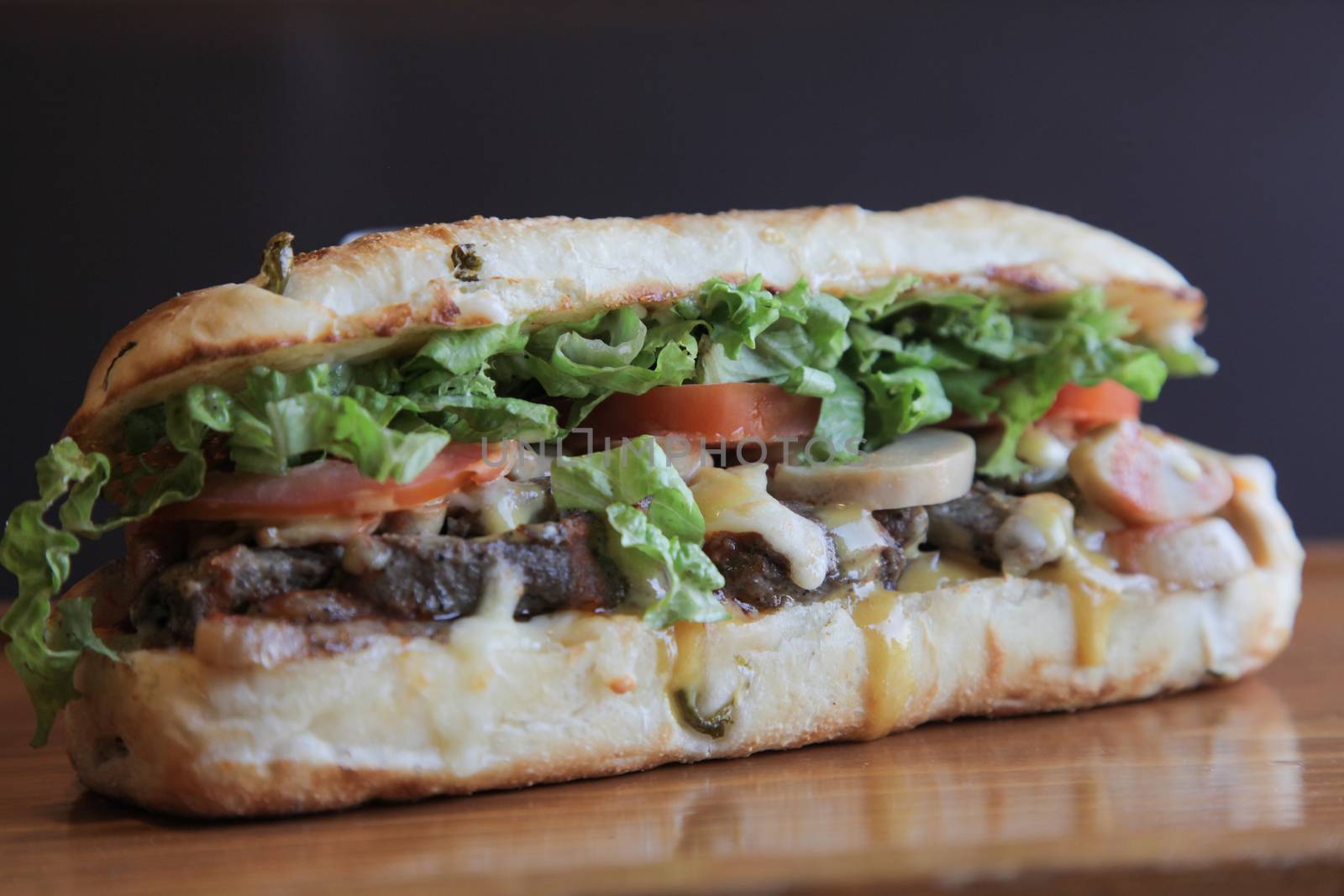 Juicy steak sandwich closeup