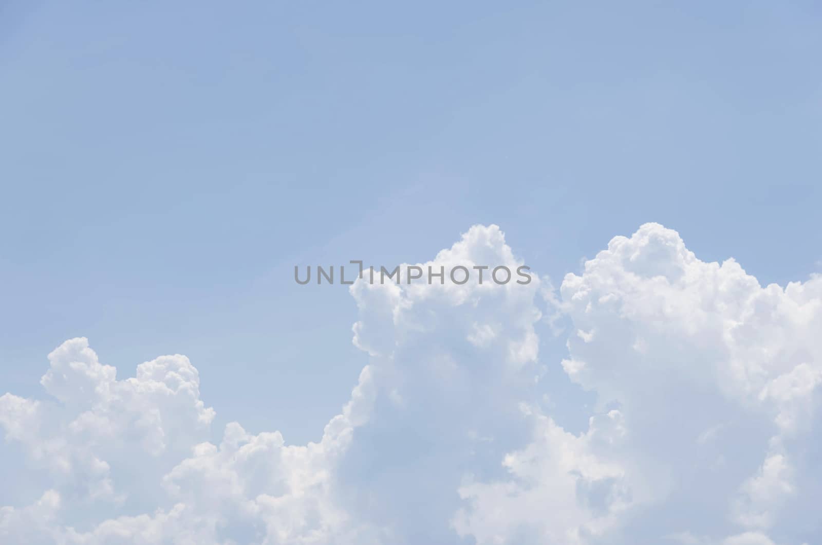 white clouds in the blue sky background