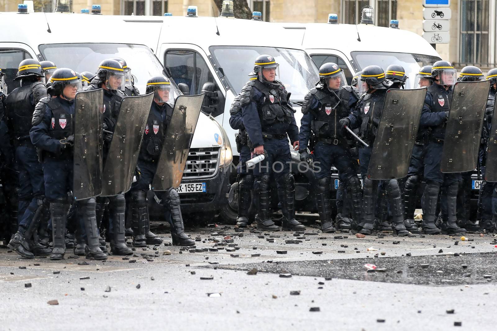 FRANCE, Paris: Riot policemen stand in line during a demo on April 9, 2016 in Paris, against the French government's proposed labour law reforms.