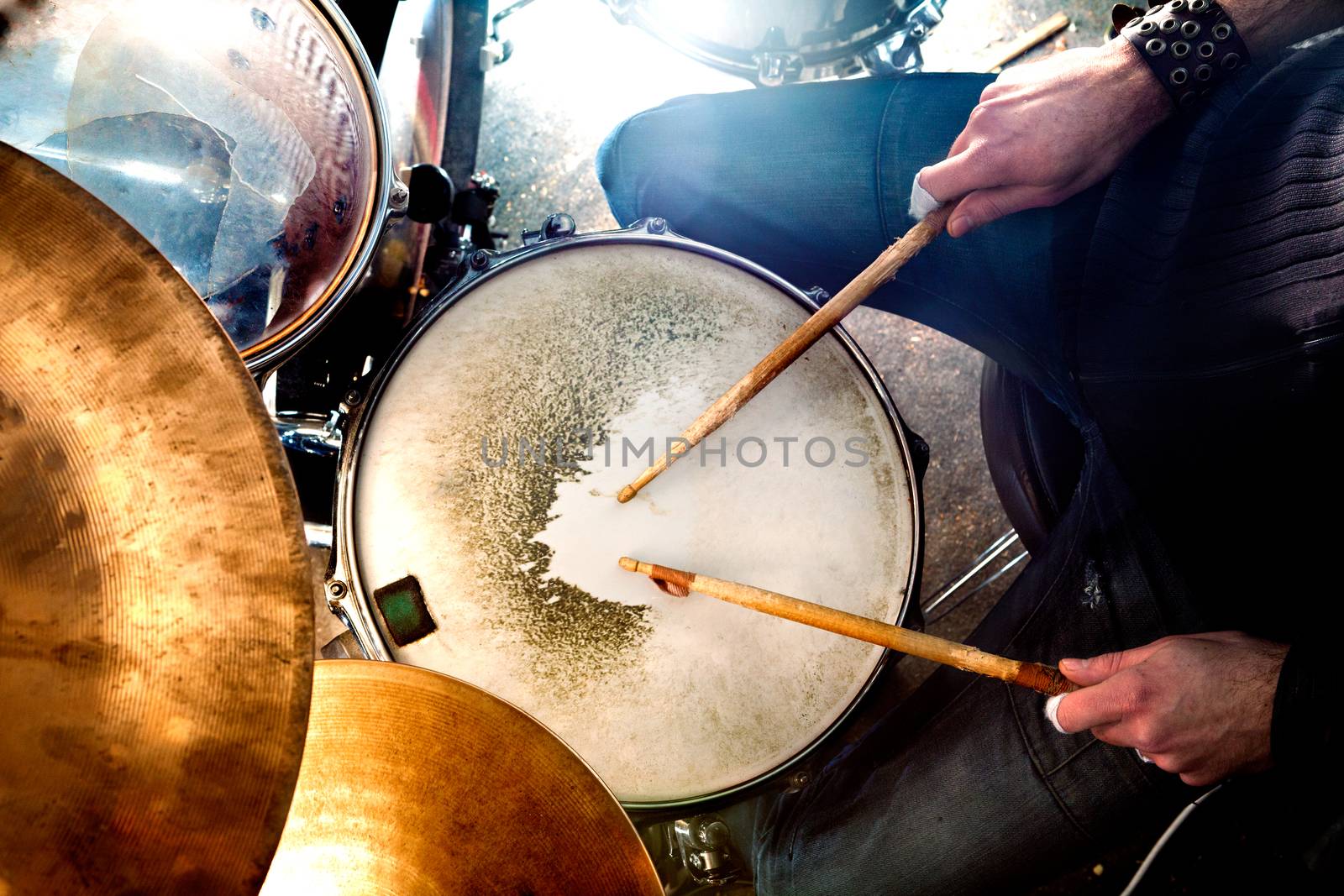 Man playing the drum.Live music background concept.Drummer and rock music