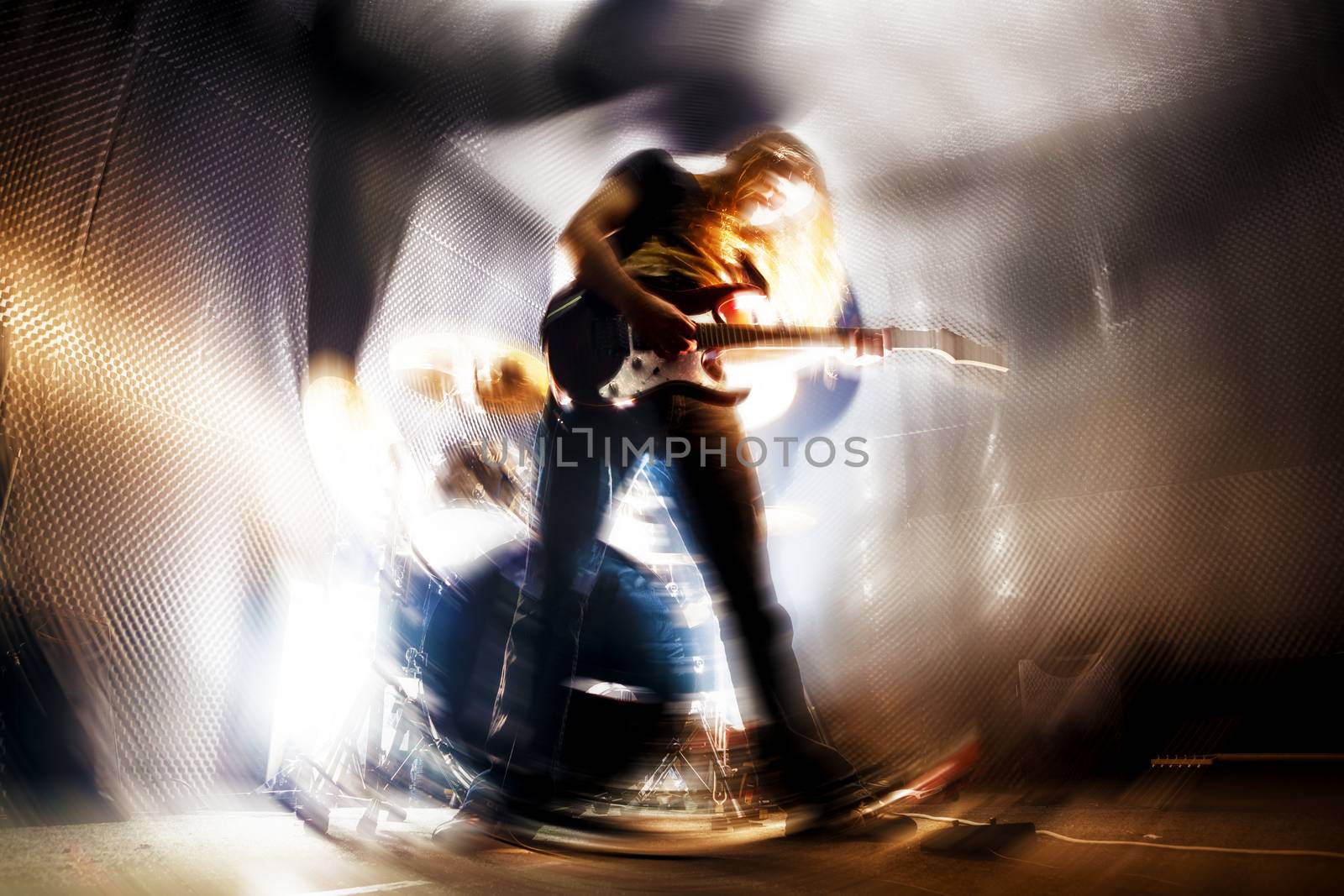 Man playing the guitar.Abstract Live music background concept.Guitar player and rock music concept