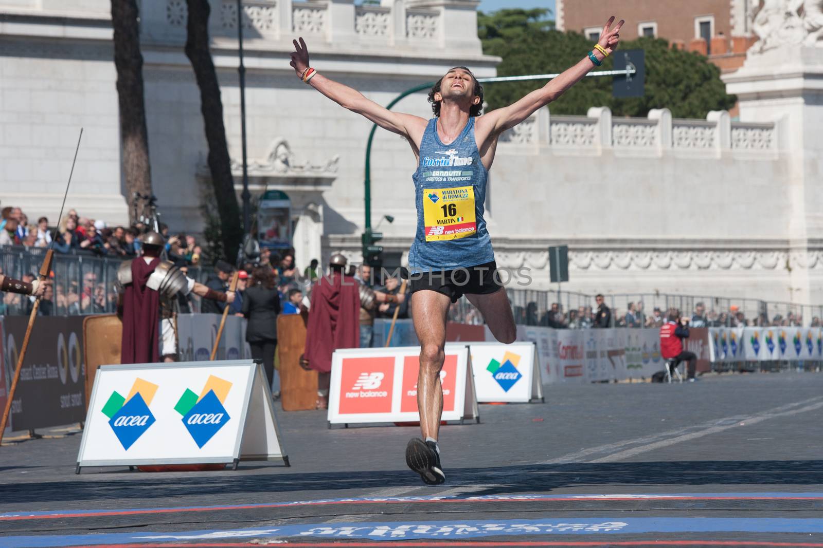 ITALY, Rome: Italian runner Martin DeMatteis crosses the finish line of Rome City Marathon in Rome on April 10, 2016. He was the first Italian athlete to cross the finish line.