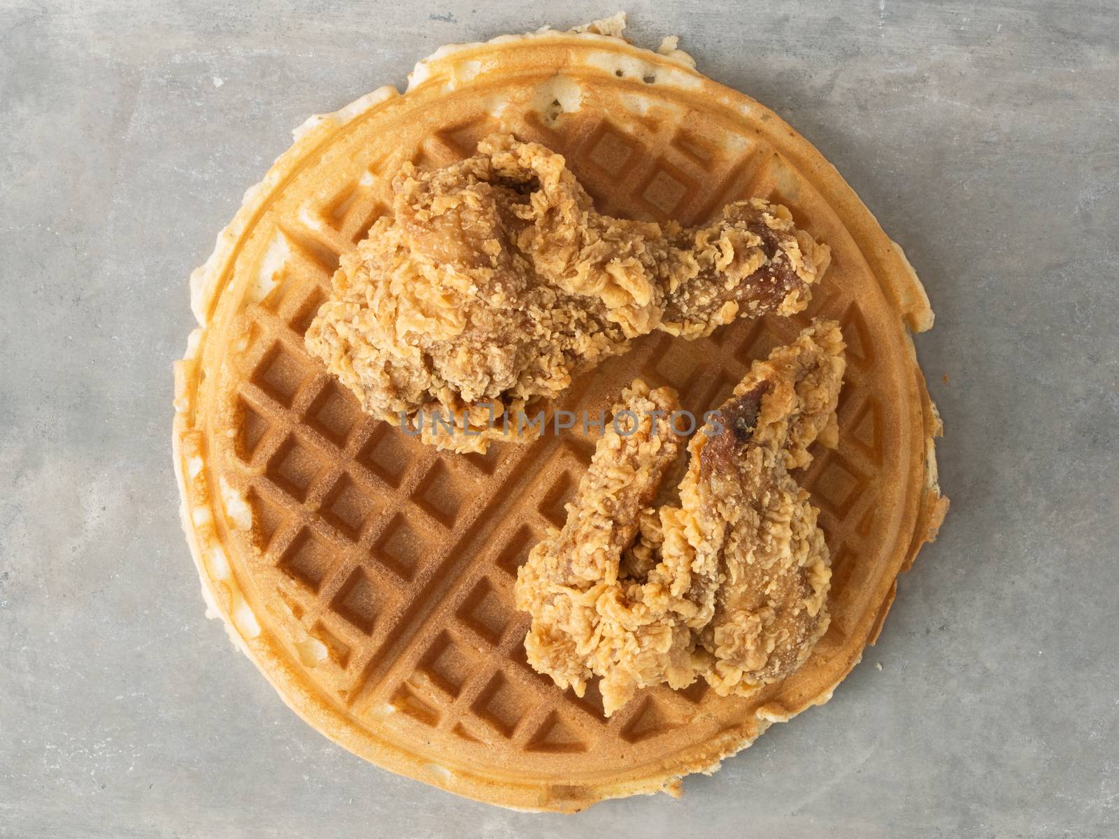 close up of rustic southern american comfort food chicken waffle