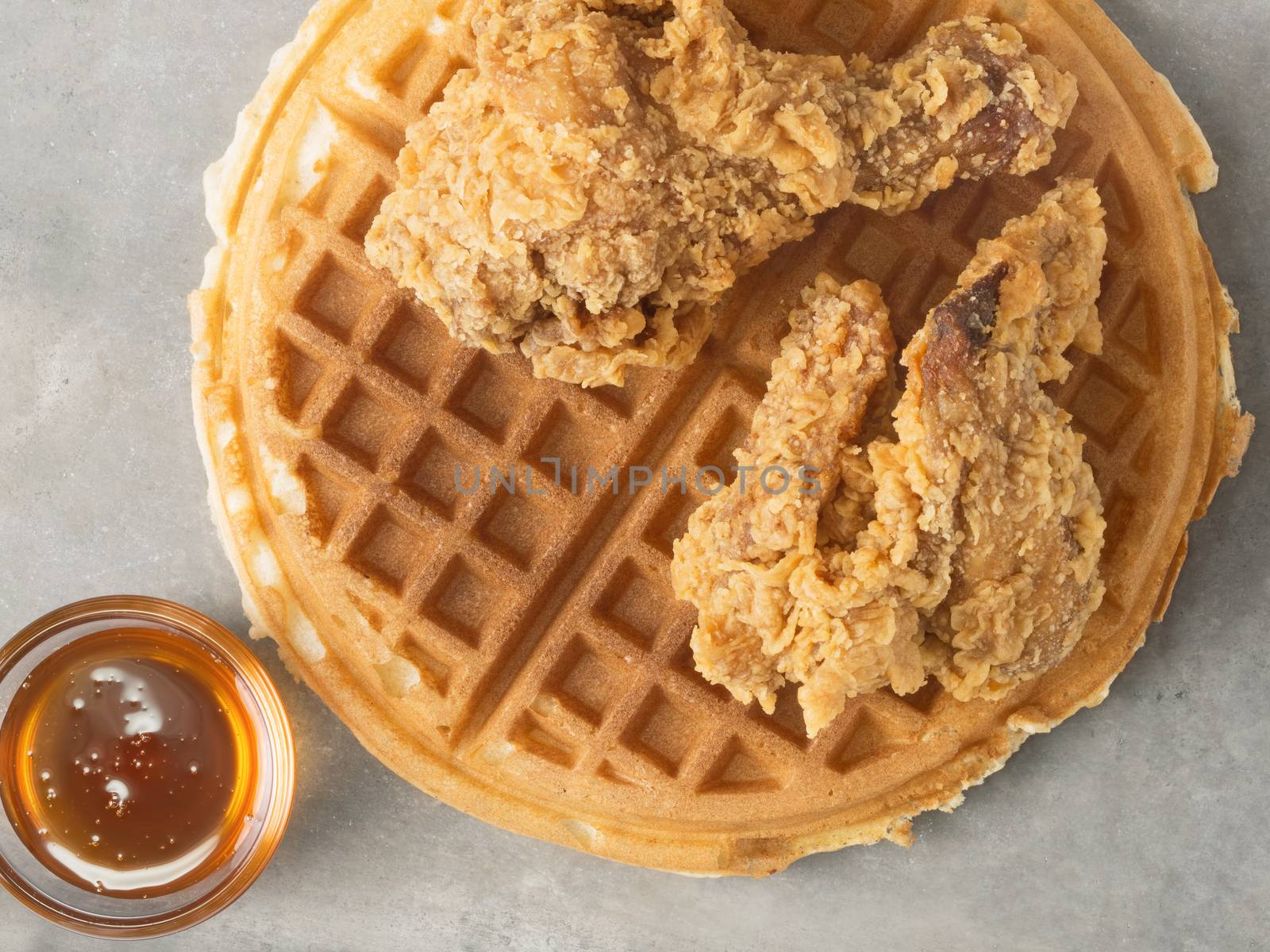 close up of rustic southern american comfort food chicken waffle