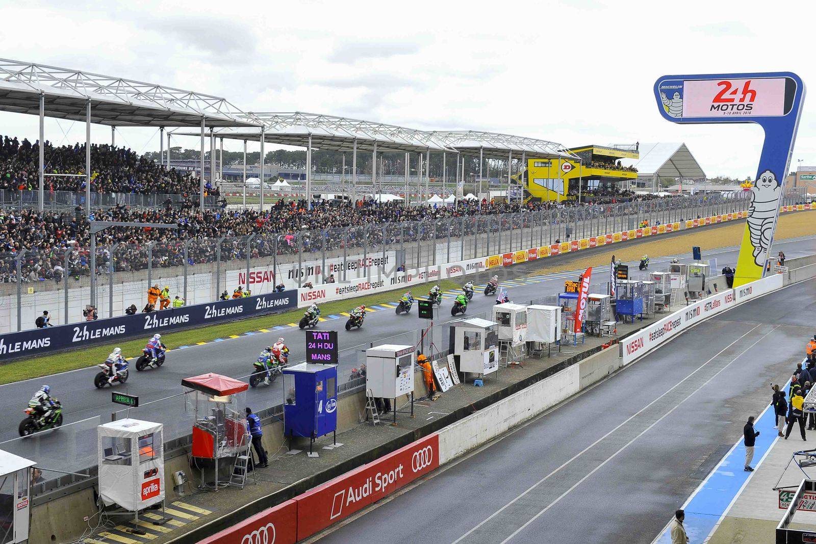 FRANCE, Le Mans: Pilots take the start of Le Mans 24 Hours moto endurance race at Bugatti track in Le Mans, France, on April 9, 2016.