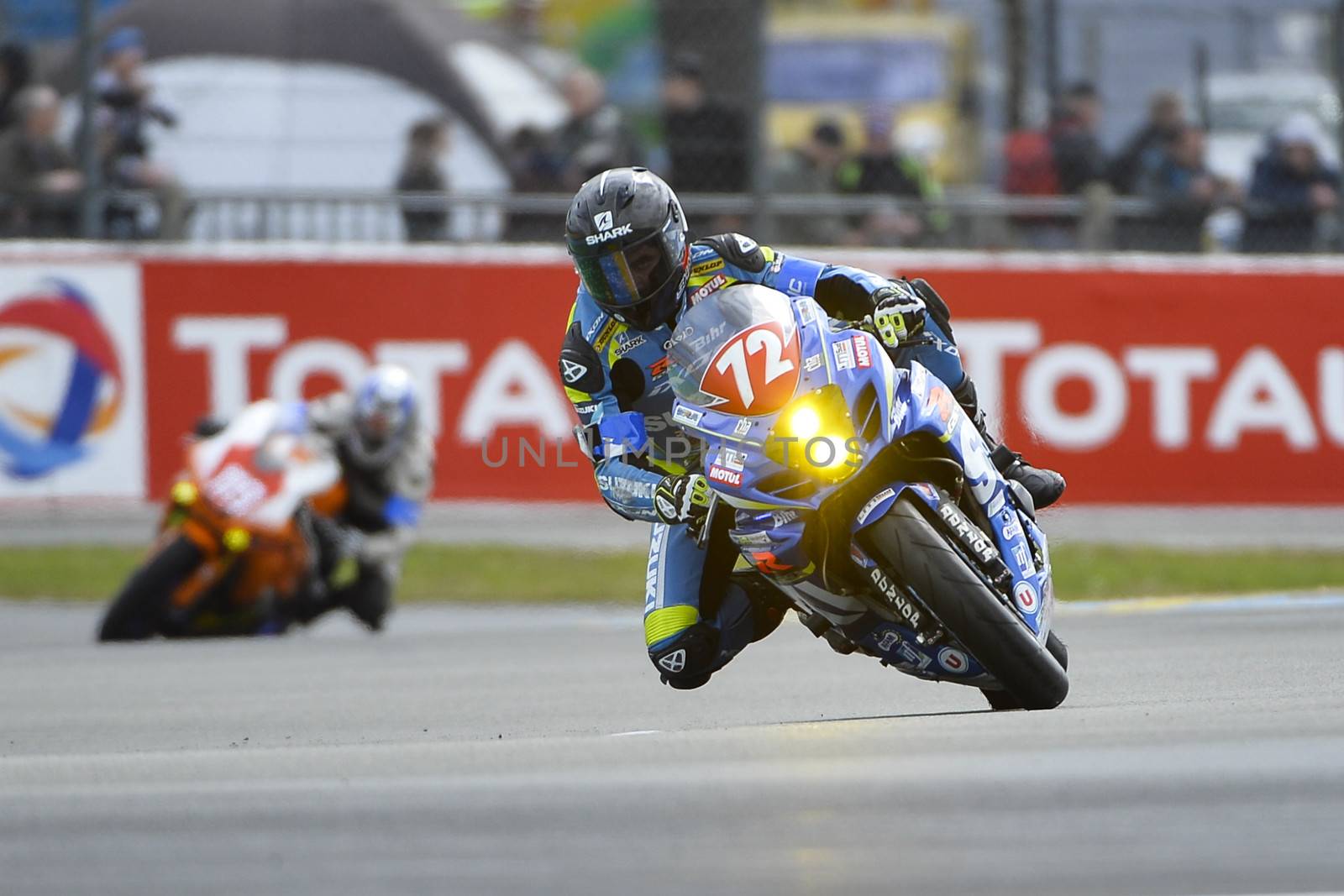 FRANCE, Le Mans: French 72 Junior Team Le Mans Sud Suzuki pilot is pictured during Le Mans 24 Hours moto endurance race at Bugatti track in Le Mans, France, on April 9, 2016.