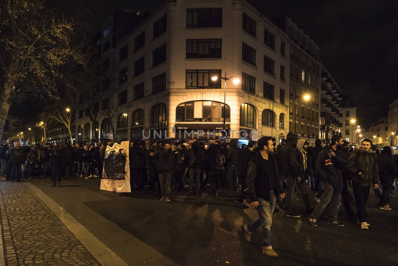 FRANCE, Paris: Nuit Debout militants hold a spontaneous demonstration, in Paris, as they want to reach French Prime minister Manuel Valls residence on April 9, 2016. 