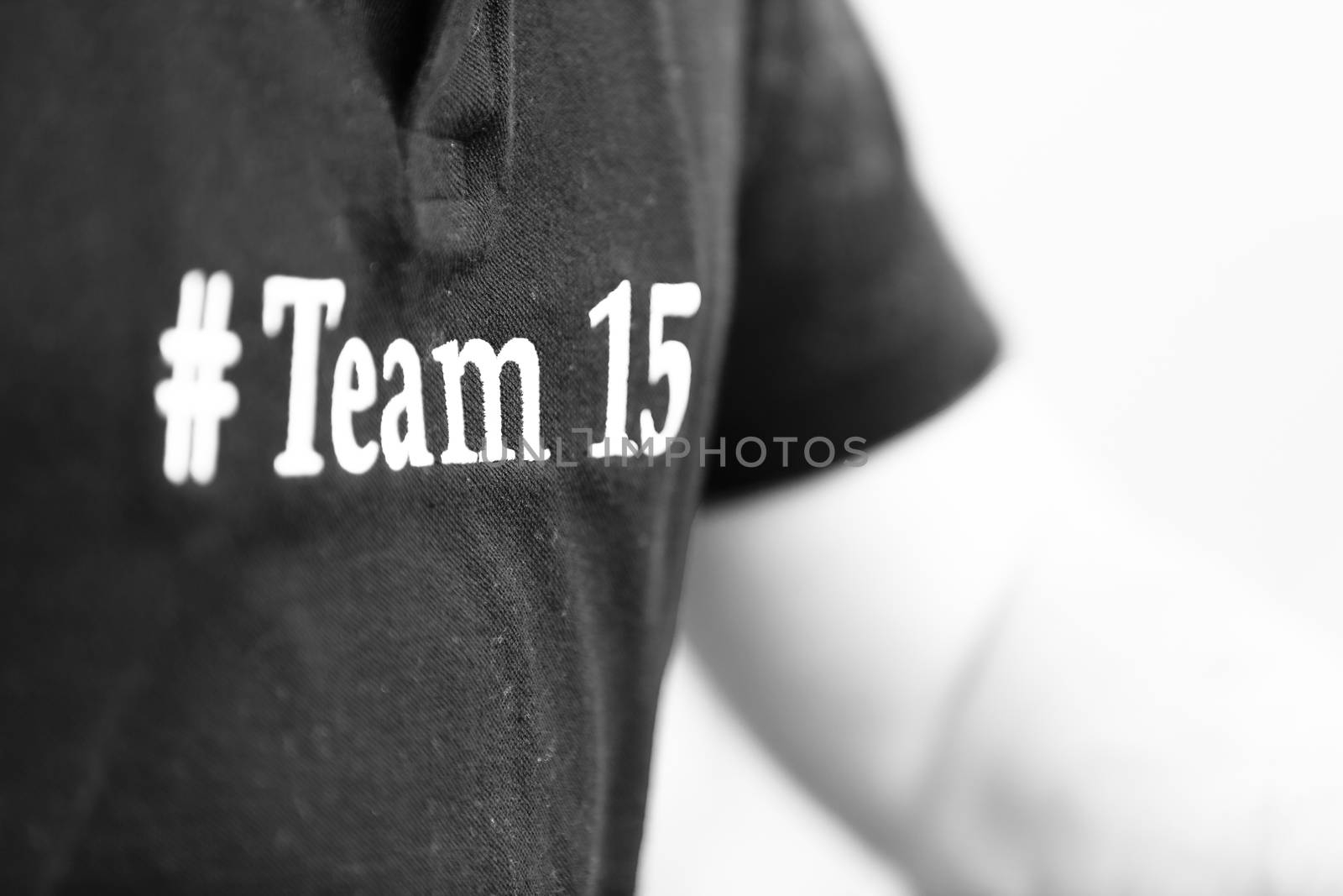 Part of body with tee-shirt Team white background