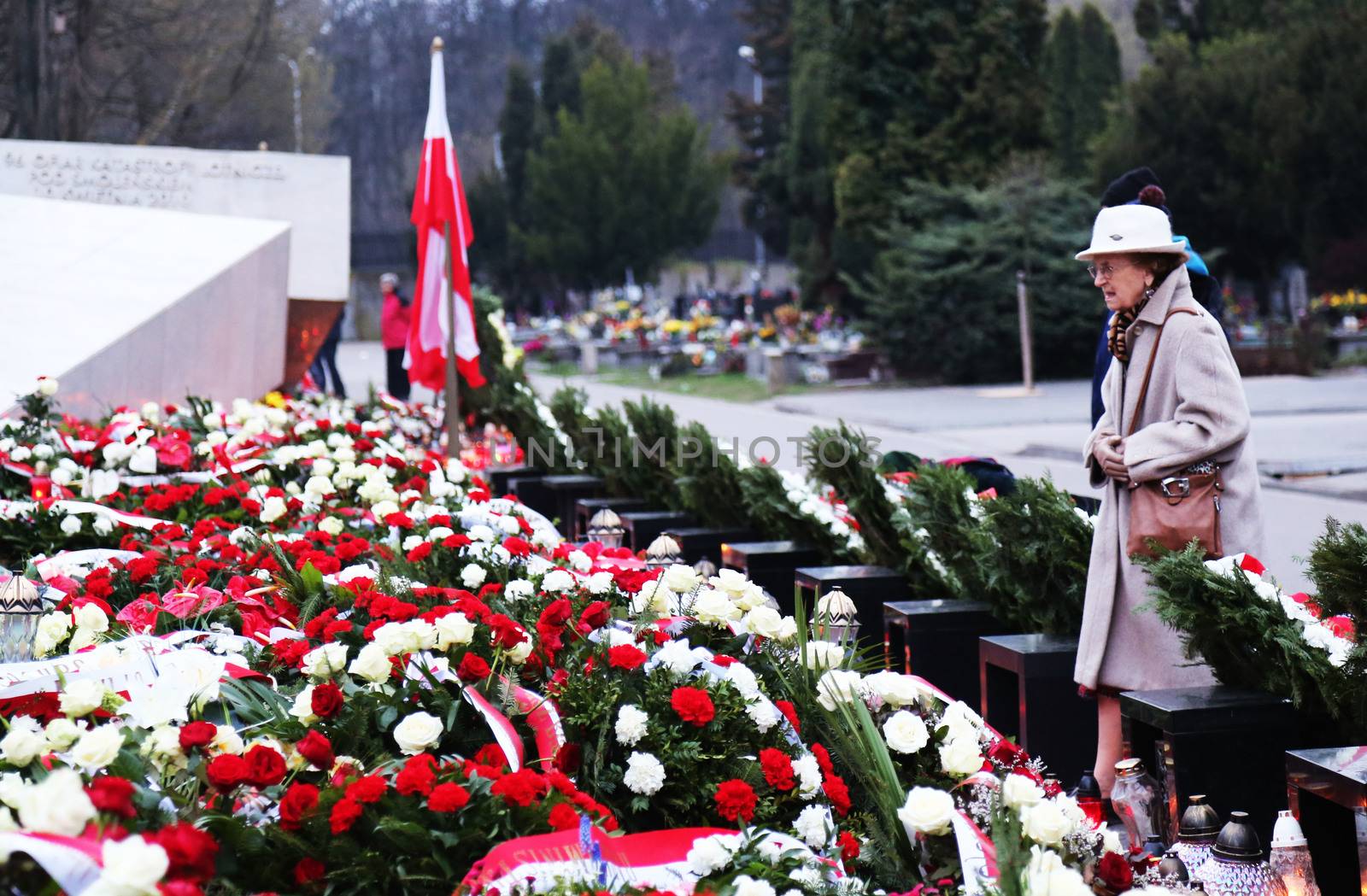 POLAND, Warsaw: Flowers are seen at the Slomensk monument at the commemoration ceremony of the Slomensk air crash at the Jozefa Oblubieńca church in Warsaw, Poland on April 10, 2016 during the sixth anniversary of the death of Polish President Lech Kaczynski and his wife Maria Kaczynska, who died along with 94 other political and military Polish elite when their plane crashed on April 10, 2010. 