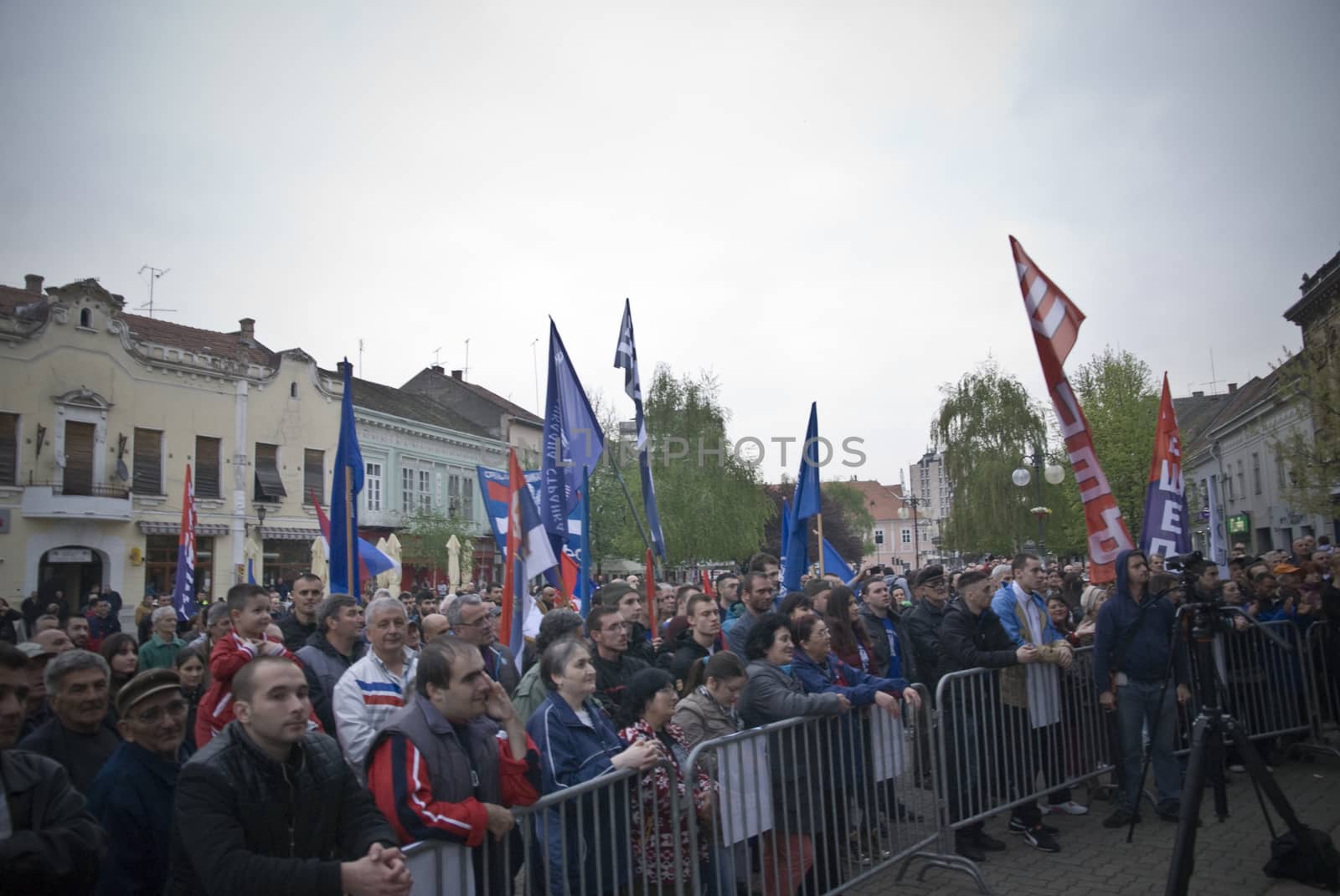 SERBIA, Vrsac: Supporters of former Serbian deputy PM Vojislav Seselj (C), who was trialed by the Hague Tribunal, wave flags at a rally in Vrsac on April 10, 2016, as part of his election campaign in Serbia. Elections which will be held in two-week. Throughout the 2016 election campaign, Seselj has visited many small cities around Serbia, including Vrsac, where 500 people attended the public rally.At this rally, Seselj yet again praised the Chetniks and Russia, while he criticized NATO, the EU and Serbia's pro-western orientation, as well as the current and former authority.