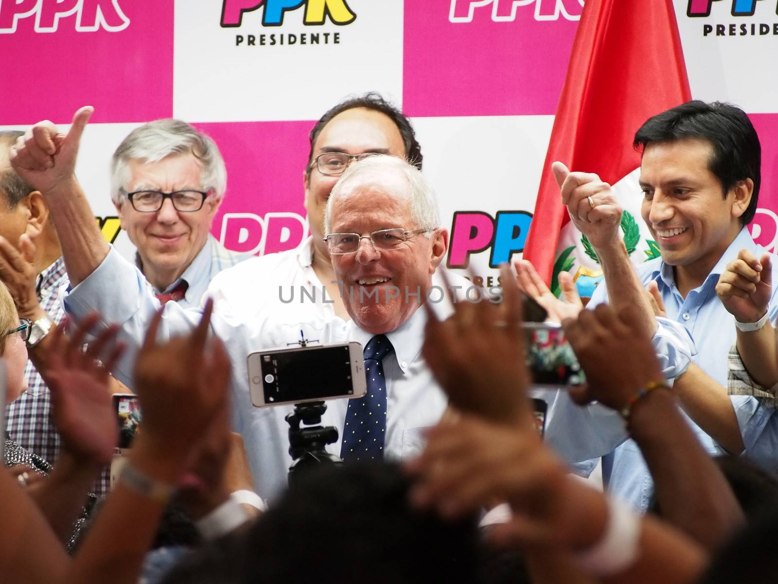 PERU, Lima: Peruvian presidential candidate for Peruanos por el Kambio (Peruvians for Change Party) and centre-right former World Bank economist Pedro Pablo Kuczynski meets with his supporters during a press conference as he was announced in the second place following the first round of Peru's Presidential Election, in Lima, Peru on April 10, 2016. The daughter of jailed former president Alberto Fujimori will face the veteran economist Pedro Pablo Kuczynski in the June run-off. 