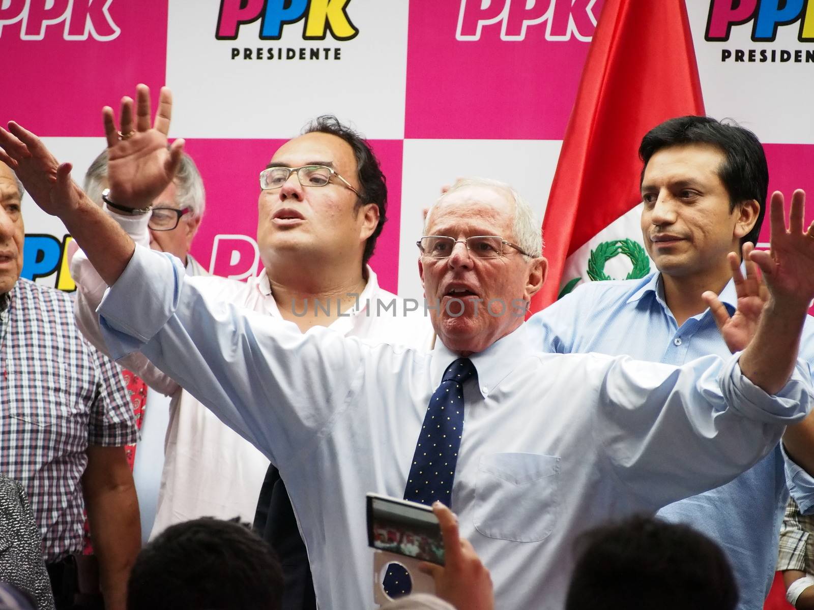 PERU, Lima: Peruvian presidential candidate for Peruanos por el Kambio (Peruvians for Change Party) and centre-right former World Bank economist Pedro Pablo Kuczynski meets with his supporters during a press conference as he was announced in the second place following the first round of Peru's Presidential Election, in Lima, Peru on April 10, 2016. The daughter of jailed former president Alberto Fujimori will face the veteran economist Pedro Pablo Kuczynski in the June run-off. 