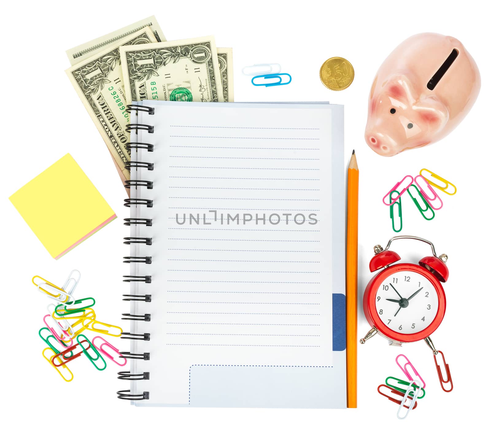 Open notebook with stationery and cash isolated white background, closeup