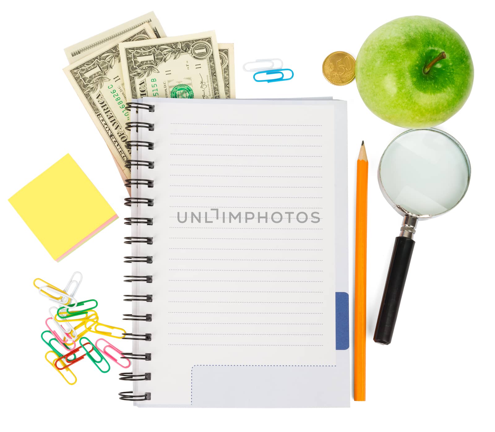 Open notebook with stationery and apple by cherezoff
