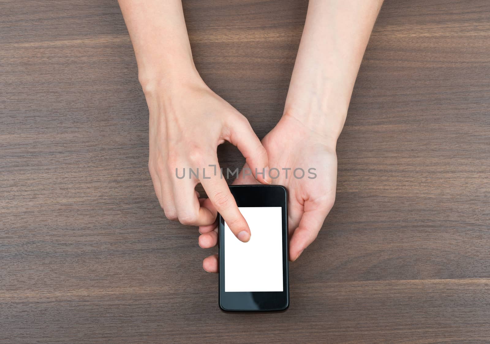 Female hands using smartphone with blank screen on isolated white background