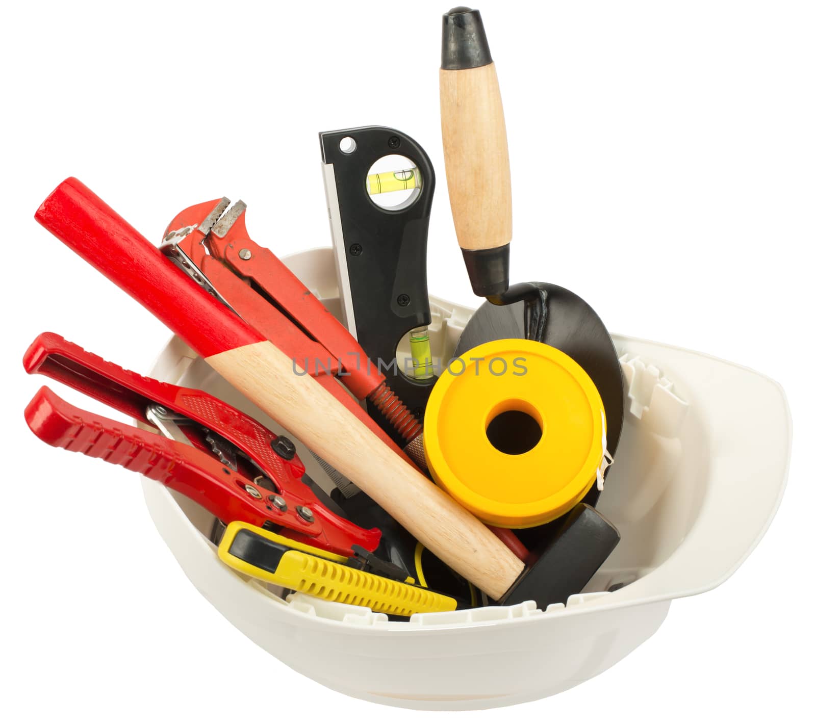 Construction worker supplies including hard hat on isolated white background, closeup