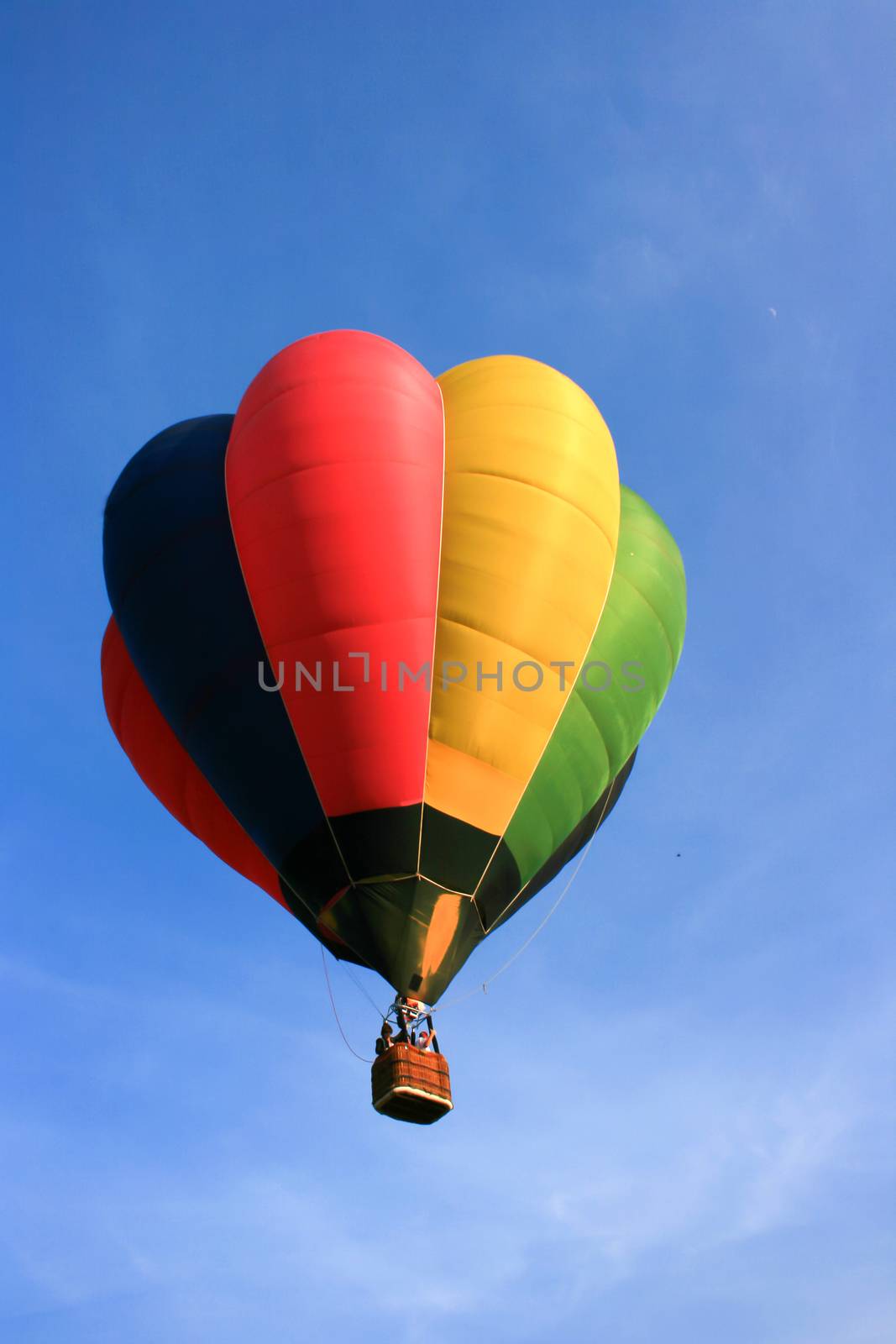 Colorful hot air balloon with blue sky background