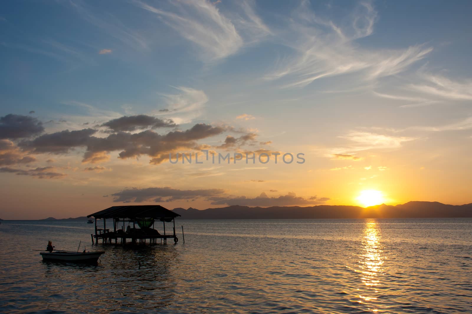 house in sunset at sea