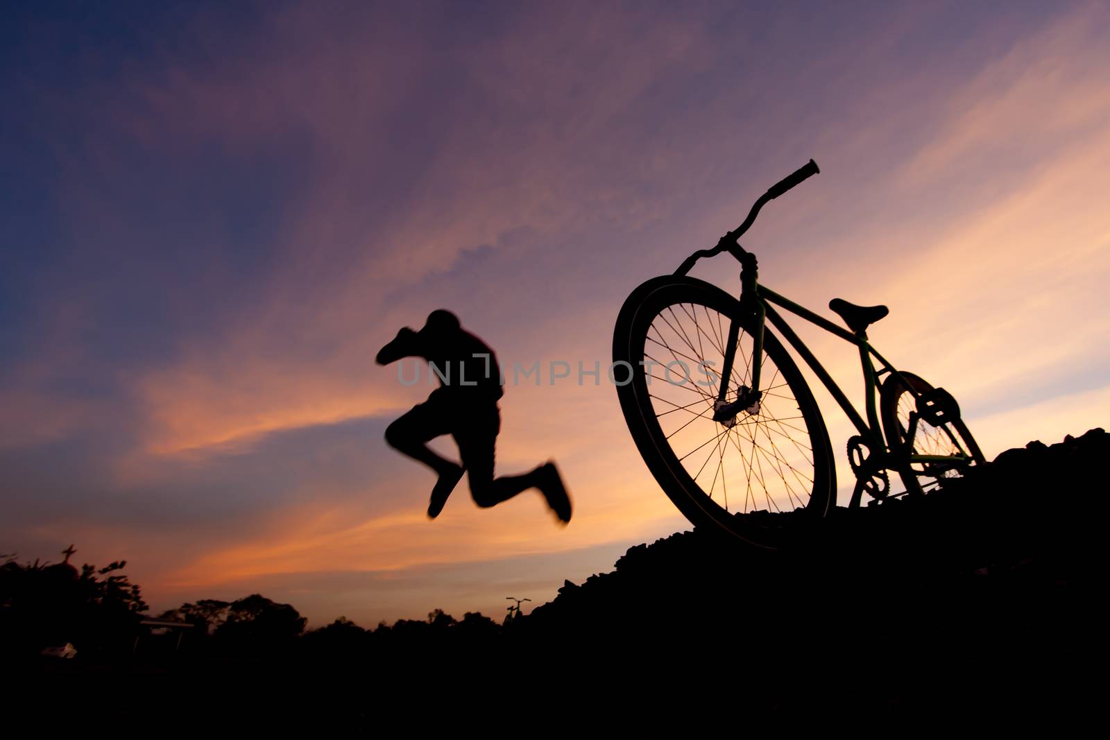 silhouette bicycle in sunset