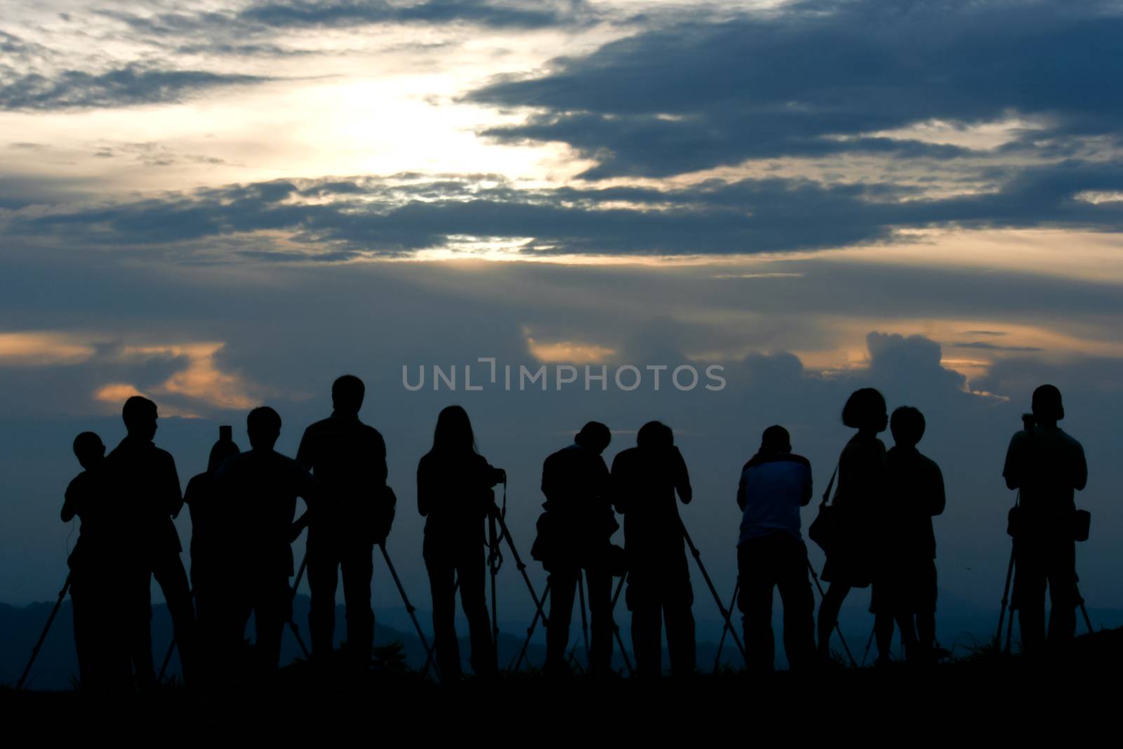 silhouette of photographer  by pkproject