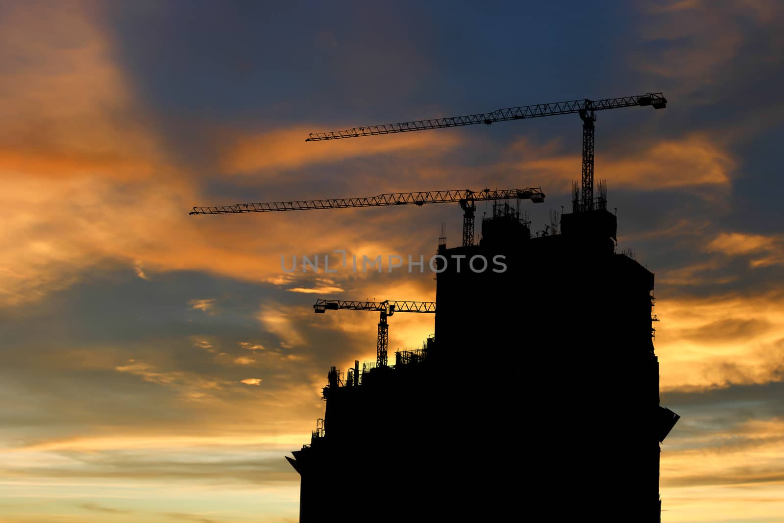 silhouette Construction site at sunset